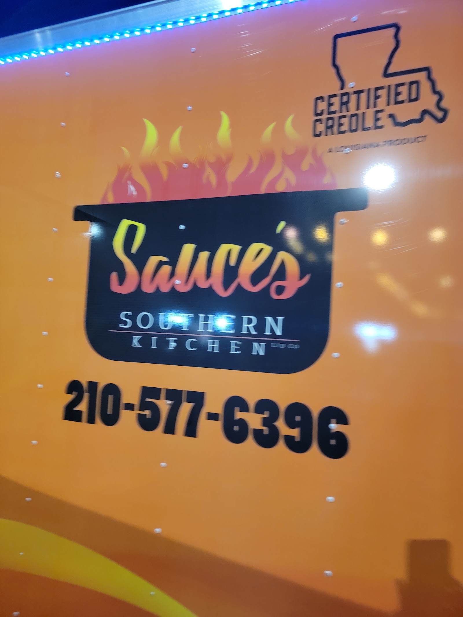 Sauce's Southern Kitchen logo with Certified Creole Louisiana Product badge on the food truck